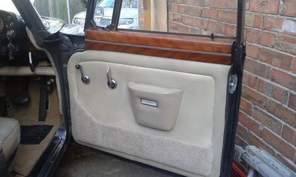 A restored rover door card,forty years old but still all the original materials.